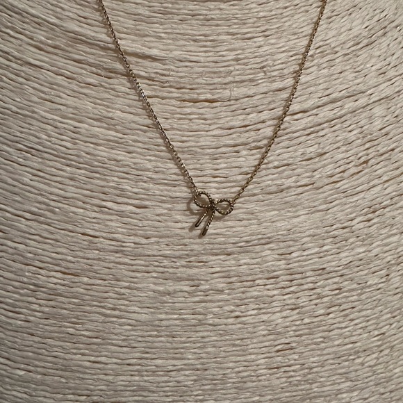 Elegant Gold Bow Pendant Necklace - Picture 2 of 3